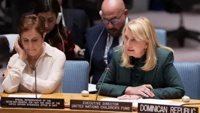 Russell, Çin Uluslararası Kalkınma İşbirliği Ajansı Başkanı Zhaohui ile bir araya geldi